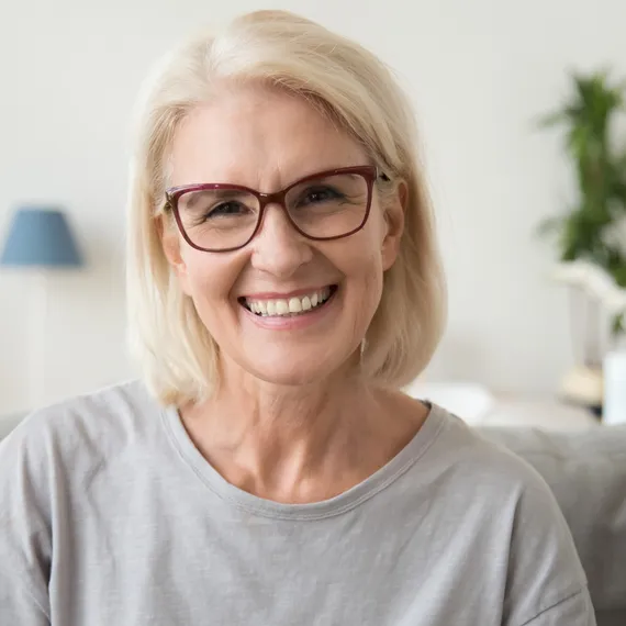 Smiling older woman wearing glasses