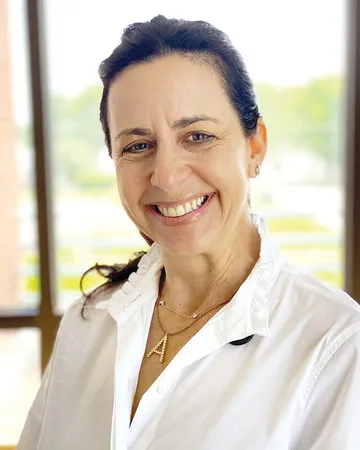 Smiling doctor in a white coat